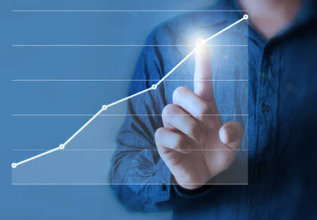 businessman Touching graph of workの写真素材