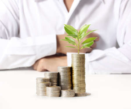 Human Hand coin to money, business ideasの写真素材