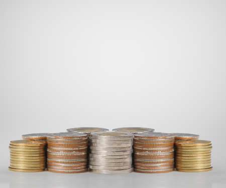 coins arranged in the form of a pyramidの写真素材