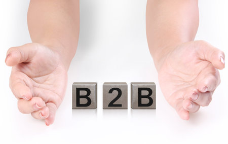 concept word forming a metal box in the open handの写真素材