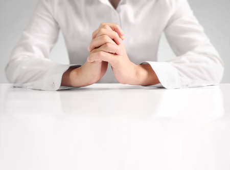 man folded his a hands togetherの写真素材