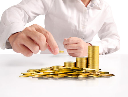 Hand human hand putting coin to money, business ideas
