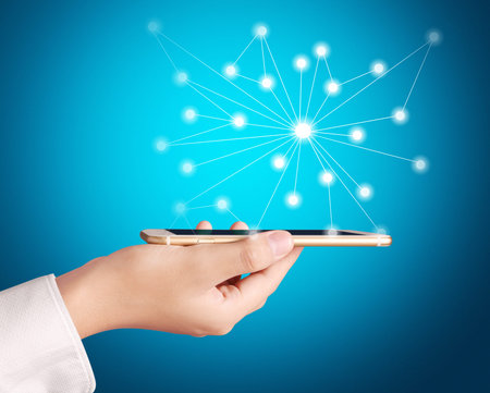 Touch screen smartphone in hand