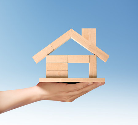 Mortgage concept by house from in handの写真素材