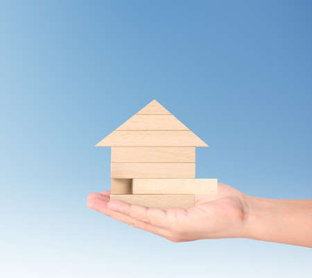 Mortgage concept by house from in handの写真素材