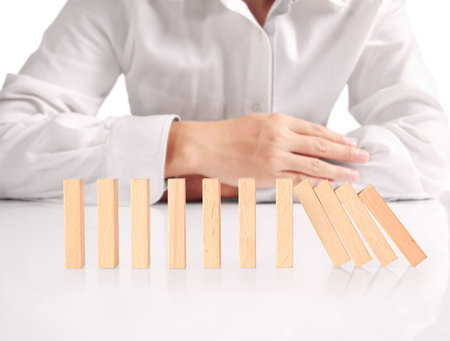 stop a dominoes continuous toppledの写真素材