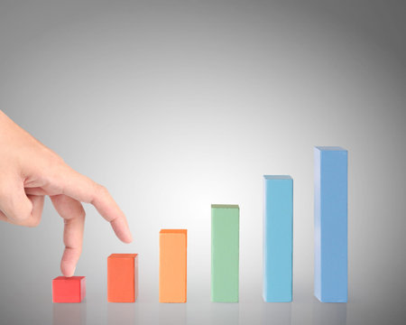 nvestment concept,businessman with financial symbols coming from hand