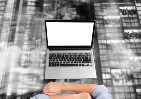 Businessman using a laptop for architectural projectの写真素材