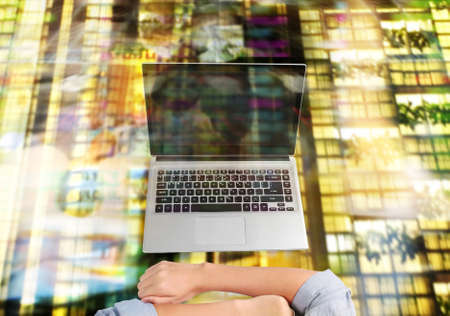 Businessman using a laptop for architectural projectの写真素材