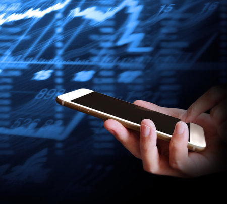 Touch screen smartphone in a hand