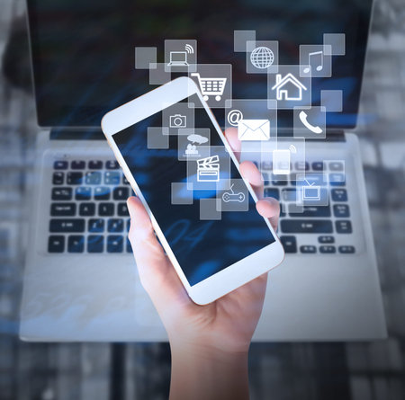Touch screen smartphone in a hand