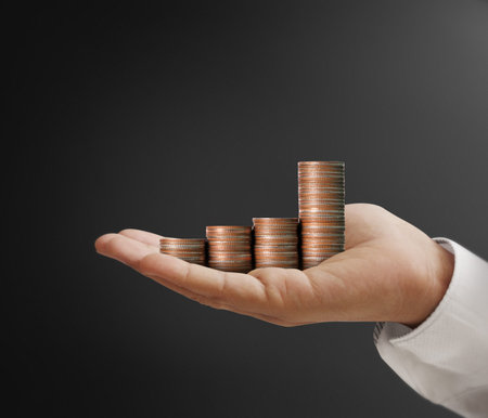 Concept of money growing from coinsの写真素材