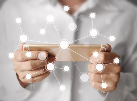 Touch screen smartphone in a handの写真素材