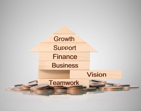 Mortgage concept by money house from coinsの写真素材