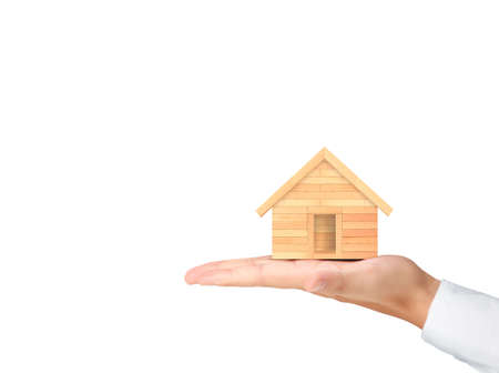 Mortgage concept by house from in handの写真素材