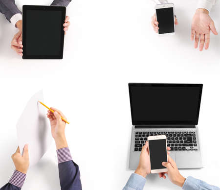 Hand holding white a blank paper sheetの写真素材