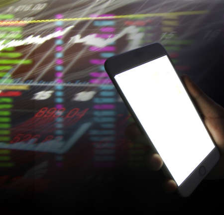 Touch screen smartphone in a handの写真素材