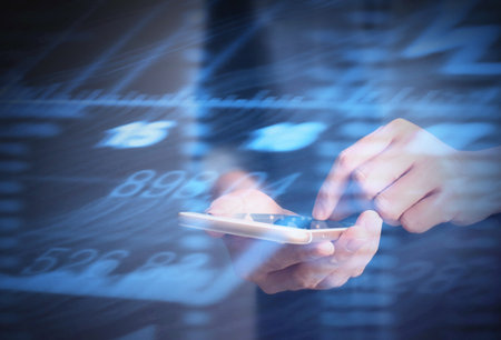 Touch screen smartphone in a hand