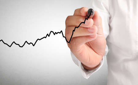 hand drawing a chart showの写真素材