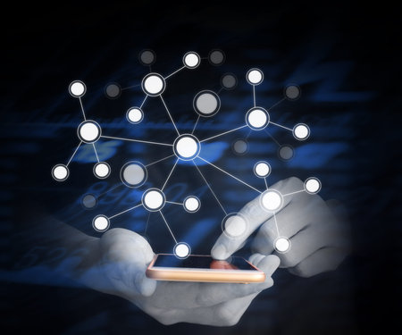 Touch screen smartphone in a hand
