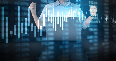 Investment concept,hand with stock financial chart symbols coming from hand