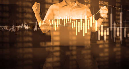 Investment concept,hand with stock financial chart symbols coming from handの写真素材