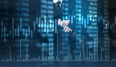 Investment concept,hand with stock financial chart symbols coming from hand