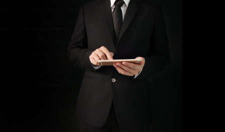 Touch screen smartphone in a  hand