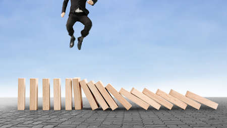 stop a dominoes continuous toppledの写真素材