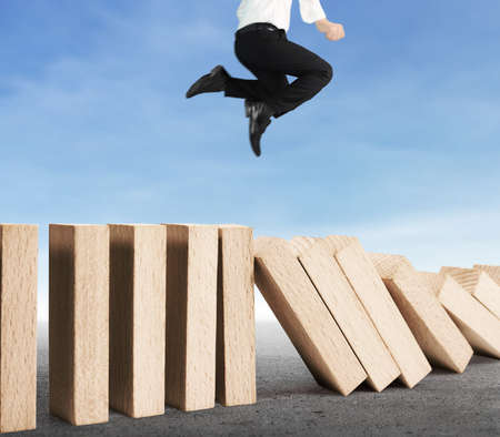 stop a dominoes continuous toppledの写真素材