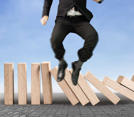 stop a dominoes continuous toppledの写真素材