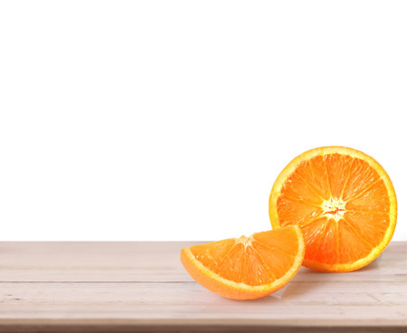 orange  on white a wooden table