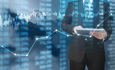 Investment concept,hand with stock financial chart symbols coming from hand