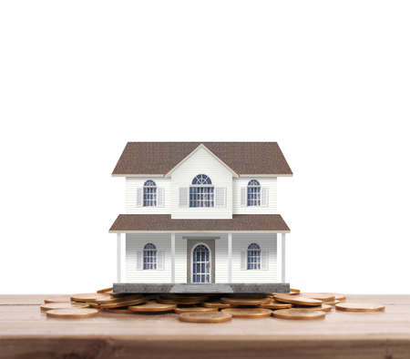 House on a pile of coins,moneyの写真素材