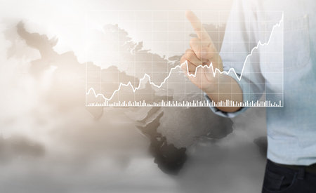 Businessman plan graph growth and increase of chart positive indicators in his business