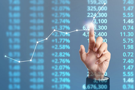 Businessman plan graph growth and increase of chart positive indicators in his business