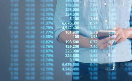 Businessman plan graph growth and increase of chart positive indicators in his businessの写真素材