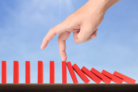 stop a dominoes continuous toppled