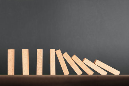 stop a dominoes continuous toppled
