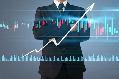 Businessman plan graph growth and increase of chart positive indicators in his business