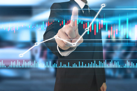 Businessman plan graph growth and increase of chart positive indicators in his business