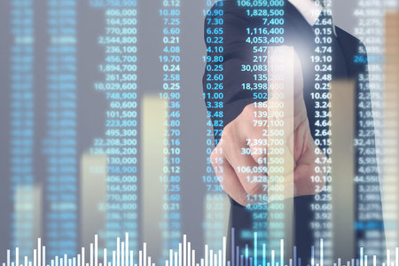 Businessman plan graph growth and increase of chart positive indicators in his businessの写真素材