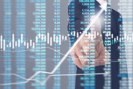 Businessman plan graph growth and increase of chart positive indicators in his business