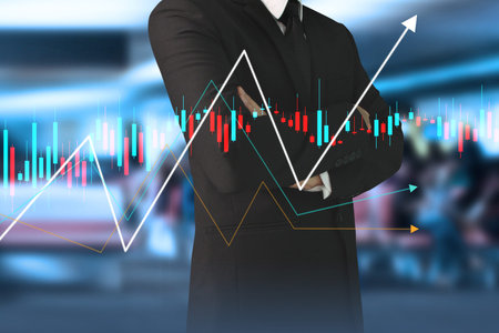 Businessman plan graph growth and increase of chart positive indicators in his business