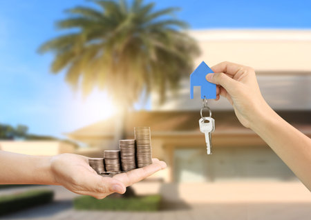 Investment concept ,House key in handの写真素材