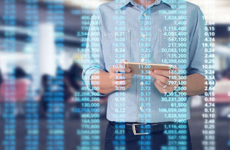 man hand holding smartphone device and touching screenの写真素材