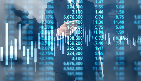 Businessman plan graph growth and increase of chart positive indicators in his business