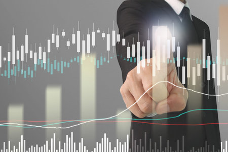 Businessman plan graph growth and increase of chart positive indicators in his business