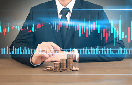 human hand putting coin to money, business ideas