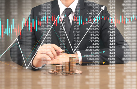 human hand putting coin to money, business ideas